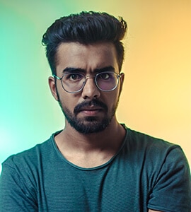 Man with glasses, colorful background